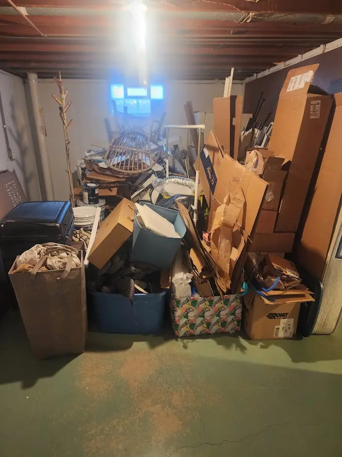 Roll-off dumpster container at job site for 2 Yard Dumpster Rental in Edgemoor